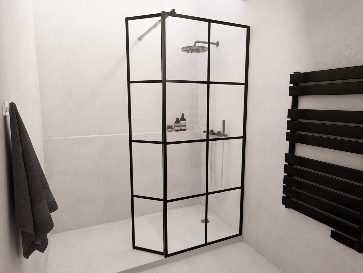Douche à l’italienne avec paroi d’angle en verre transparent et profilés noirs style verrière d’atelier, robinetterie chromée et sèche-serviettes noir.